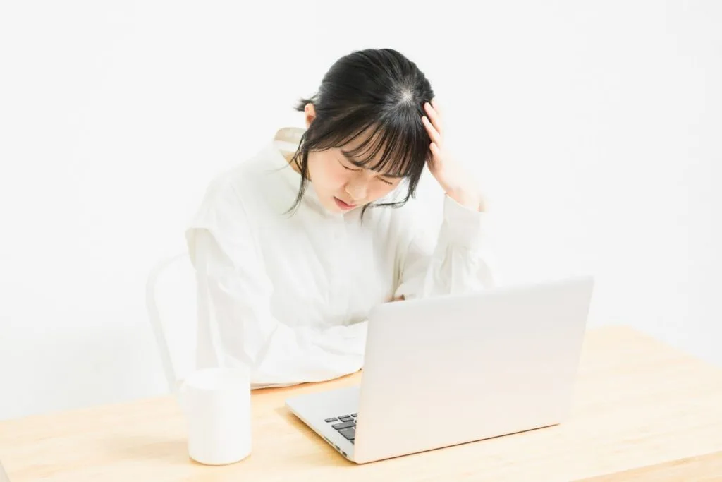 体調が悪そうな女性